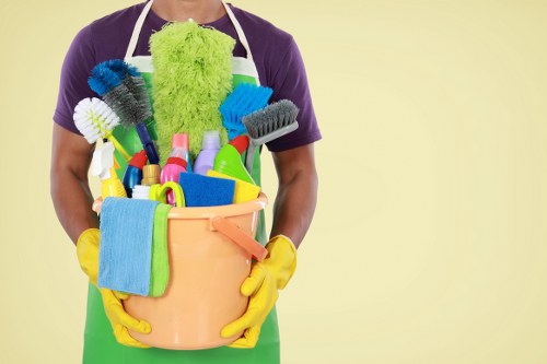 Commercial cleaners working in a Balham office reception area